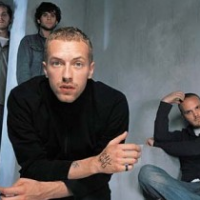 Фото Крис Мартин из Coldplay борется с ухудшением слуха