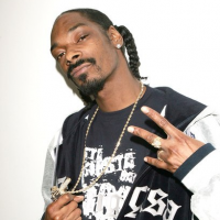 Фото Рэпер Snoop Dogg стал дедушкой  